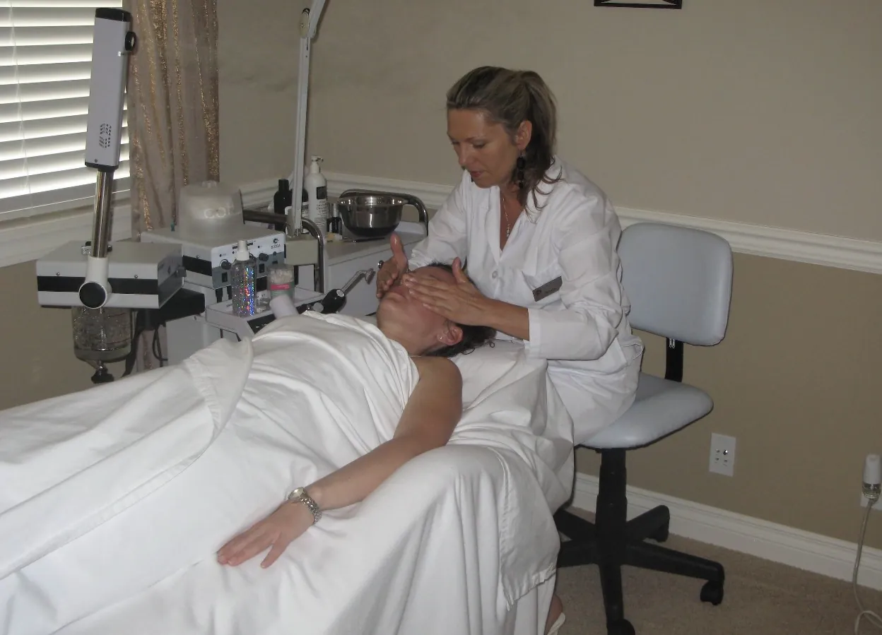 Renata giving a European facial in the Renton Skin Care treatment room